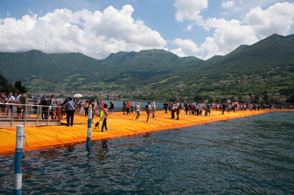 Christos-The-Floating-Piers-The-orange-walkway-connecting-Sulzano-and-Monte-Isola-Monte-Isola-Lake-Iseo-Italy